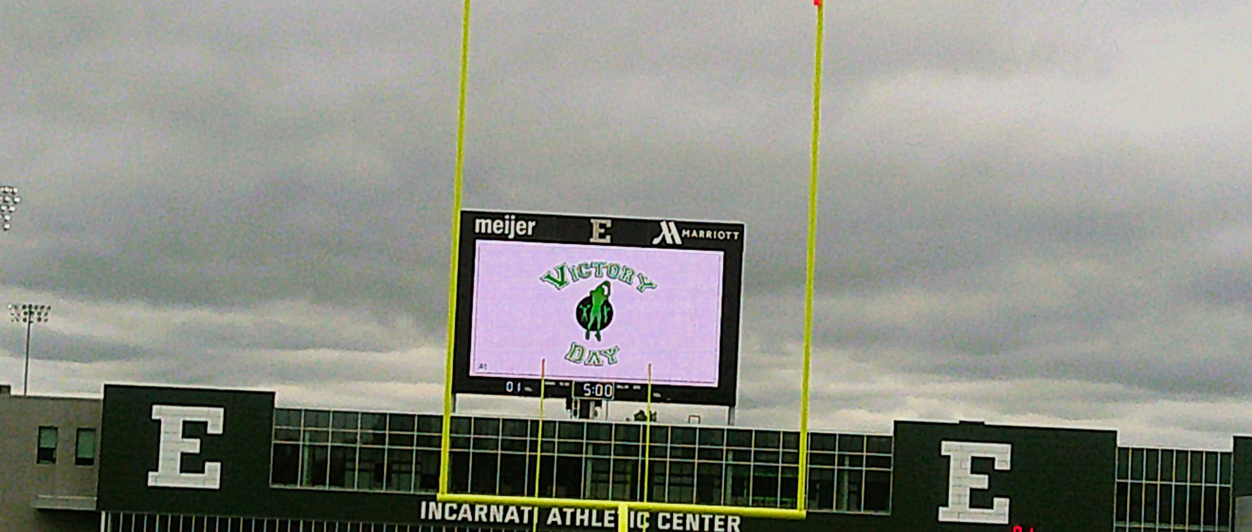 Eastern Michigan University Victory Day scoreboard and football field