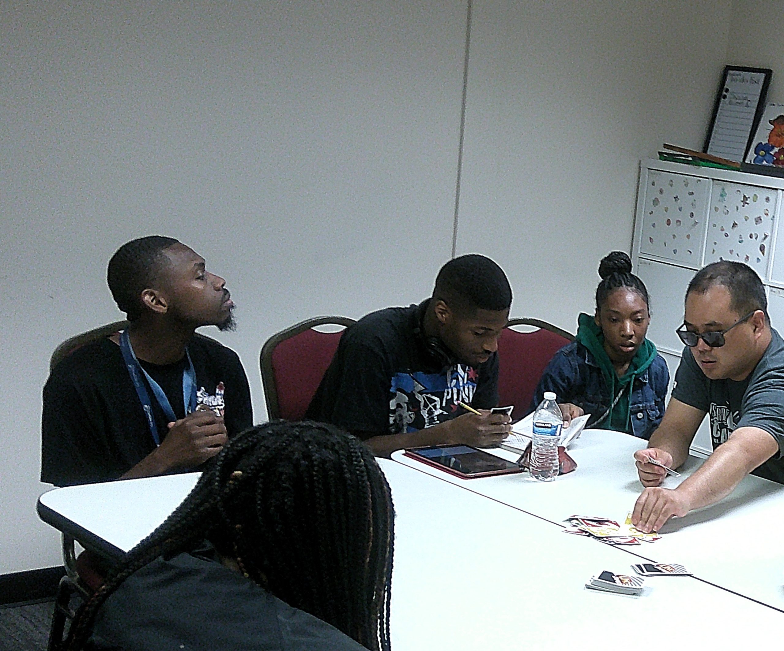 Three participants actively playing a recreational game together